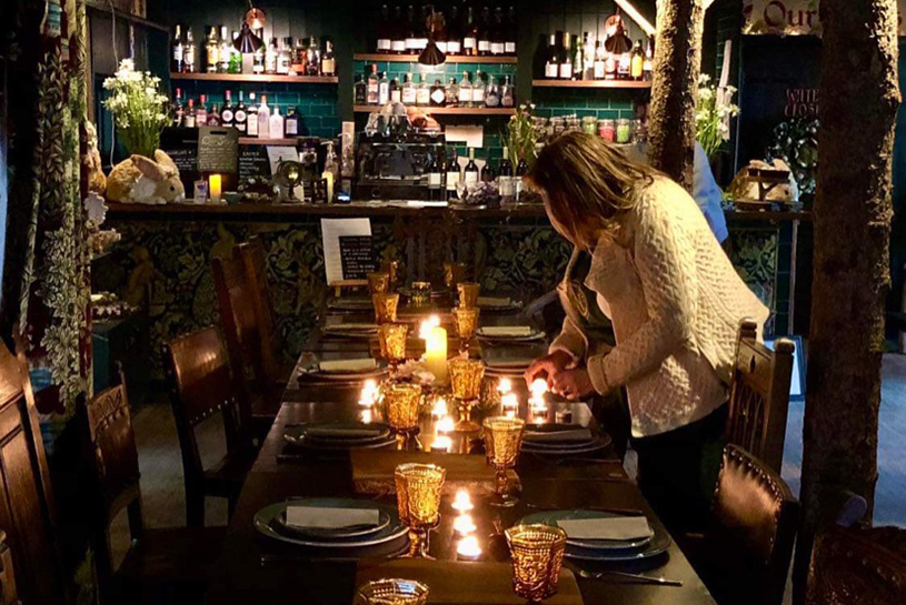 A dining area decorated with candles